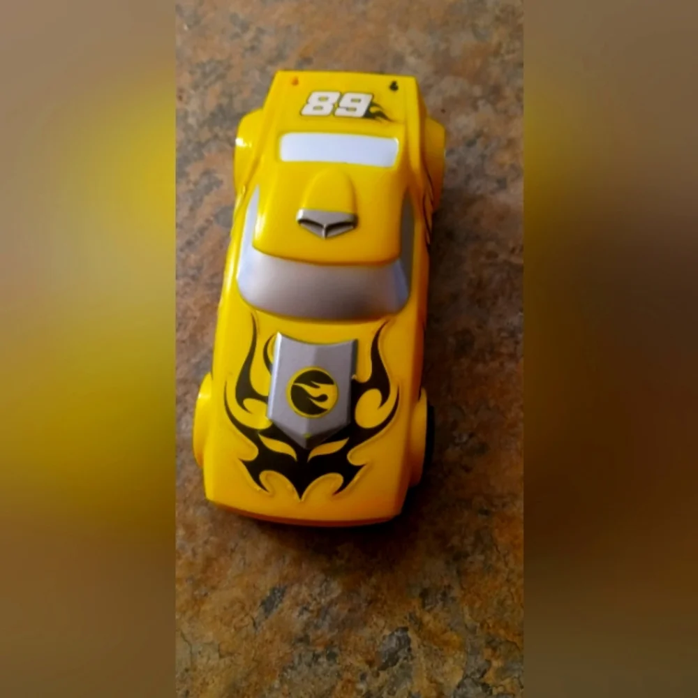 Hotwheels pull back car yellow Kids Race Car Toy with Black Flame Graphics